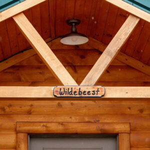 Wildebeest Cabin overhead sign