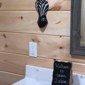 Zebra Cabin - welcome text and zebra wall decor